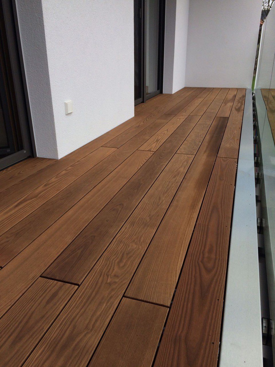Thermally modified ash laid as a balcony floor