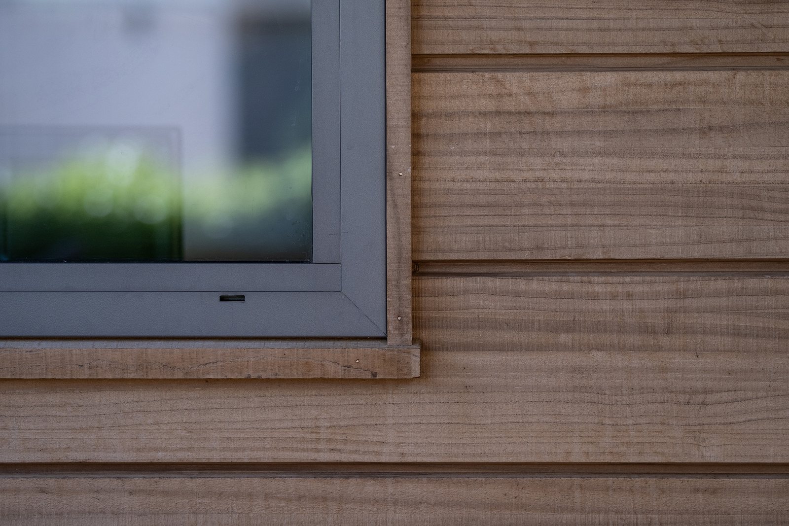 Modified cladding detail where it meets a window opening