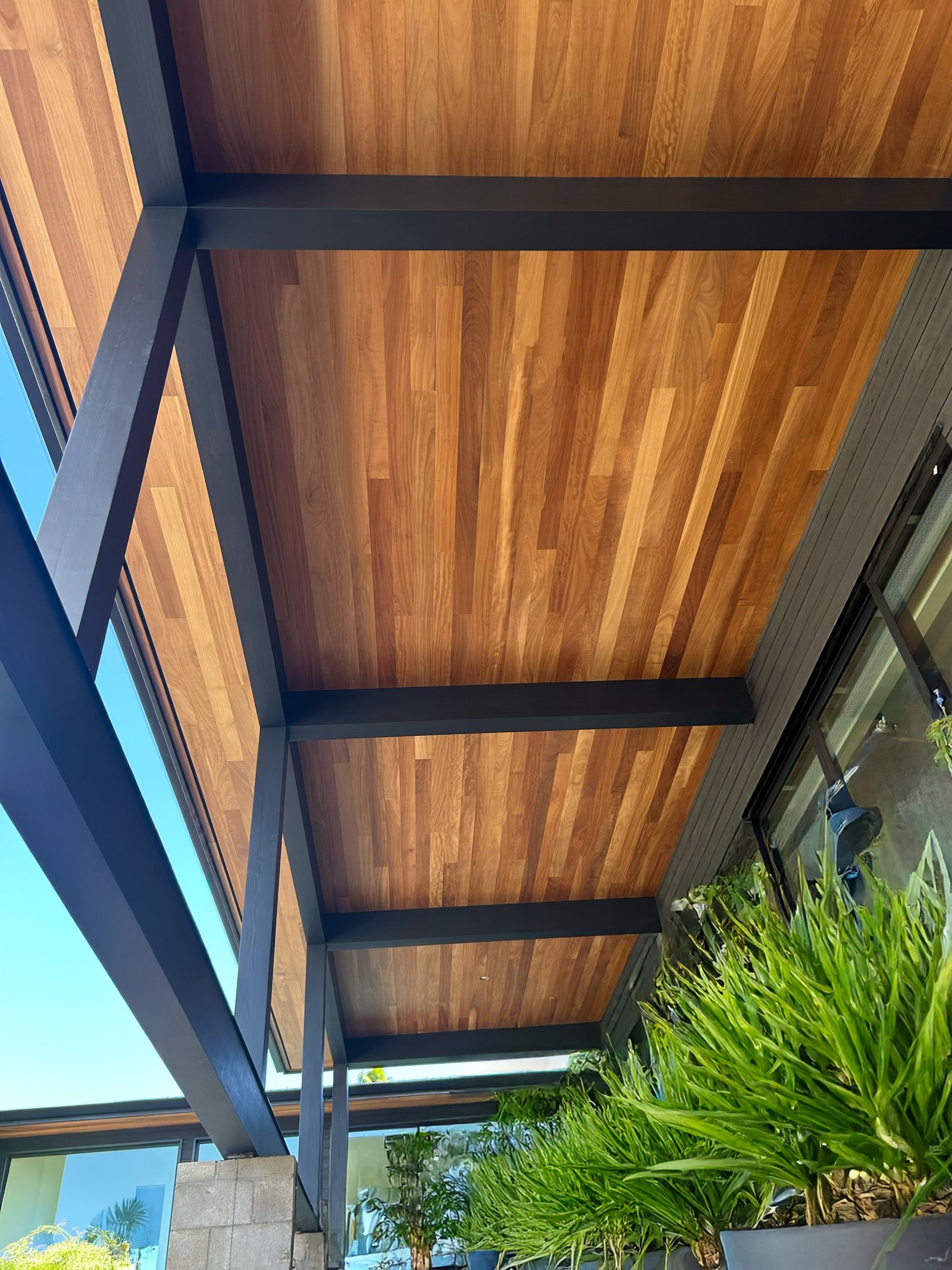 Porch roof with its rafters and beams left exposed