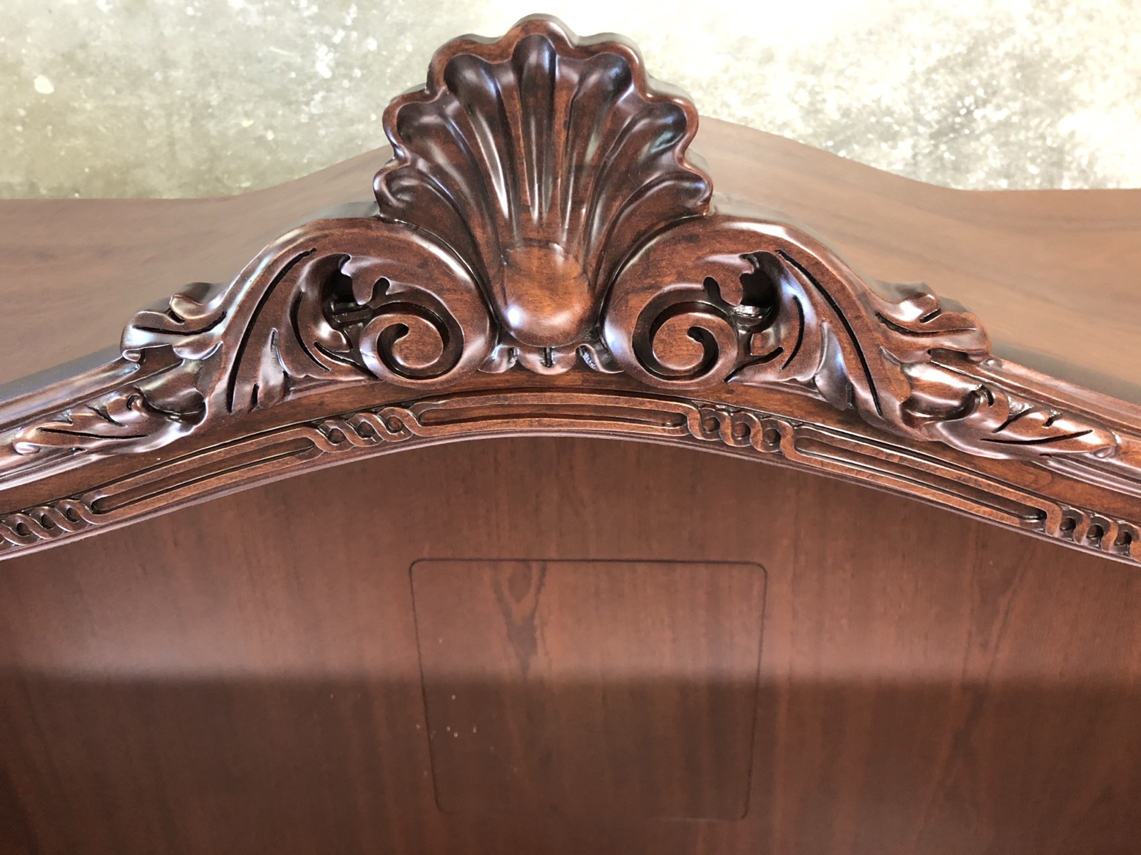 Carved cornice detail above a run of cabinetry