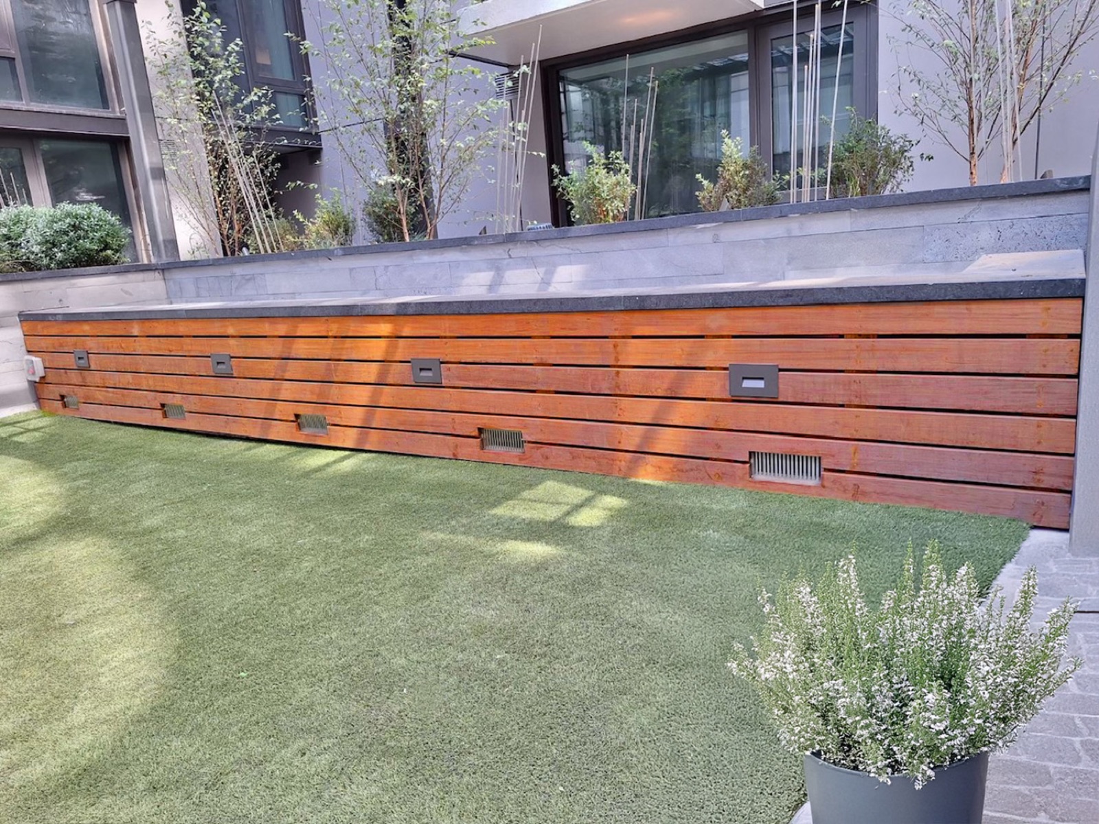 Milled hardwood garden wall in an exterior setting