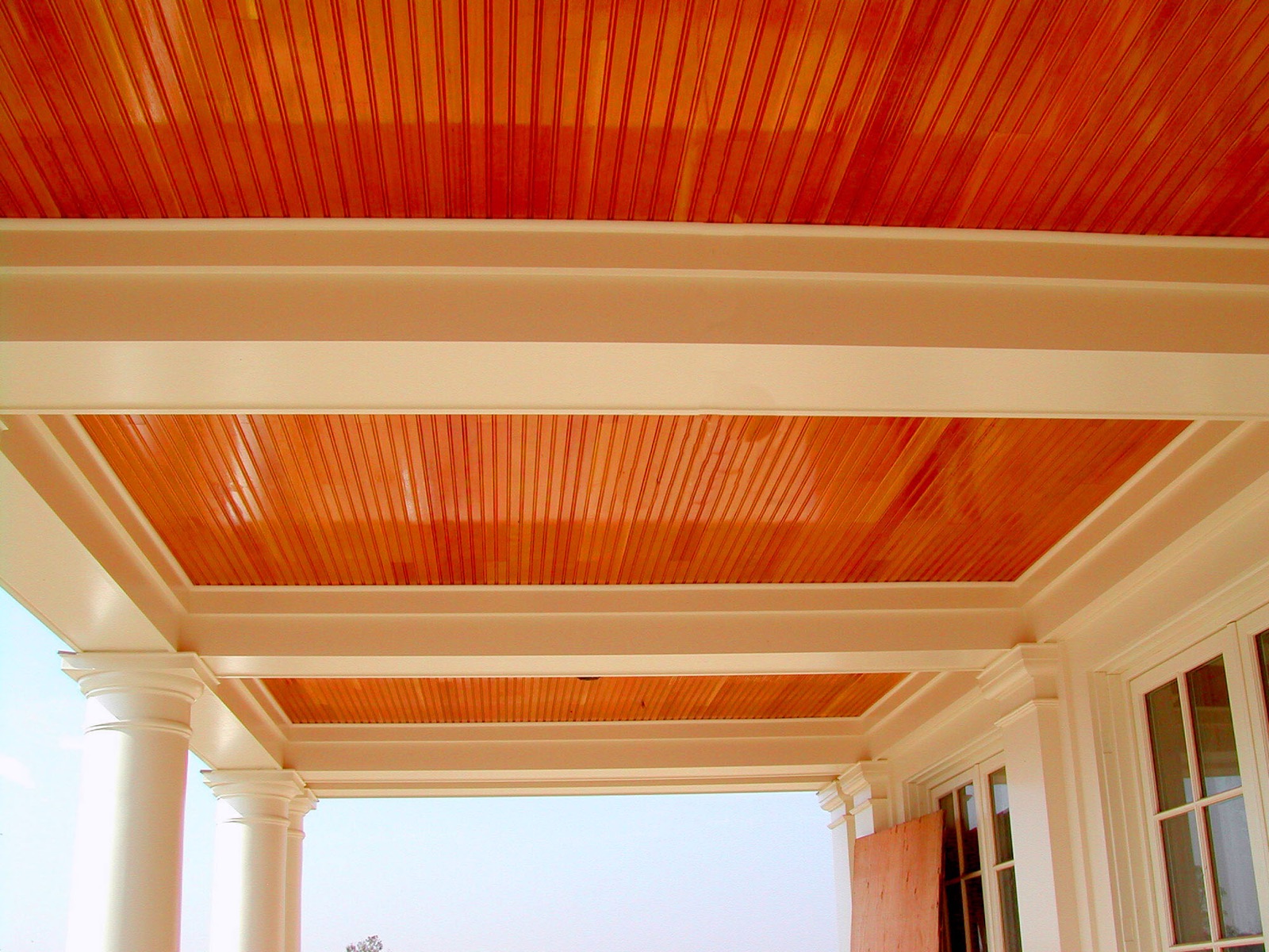 Tongue and groove ceiling carried on exposed beams