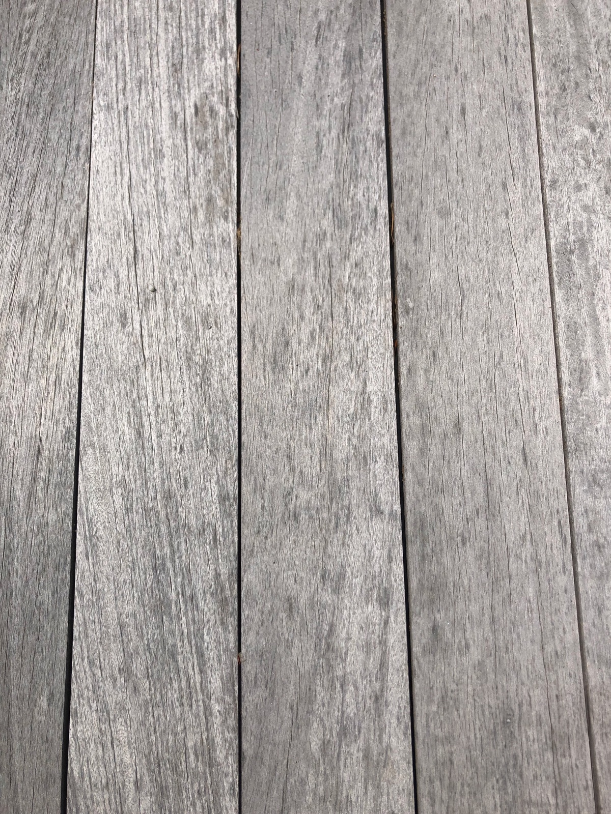 Which Unfinished Tropical Decking Actually Stays Chore-Free: A Failure-Mode Ranking