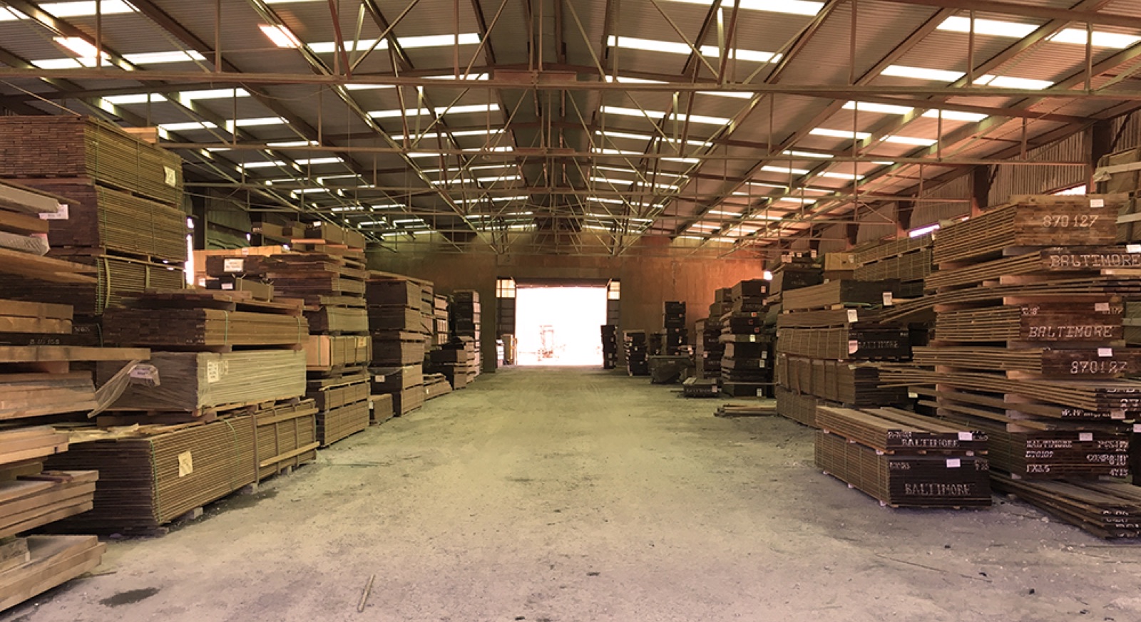 Tropical decking inventory held under cover at the yard