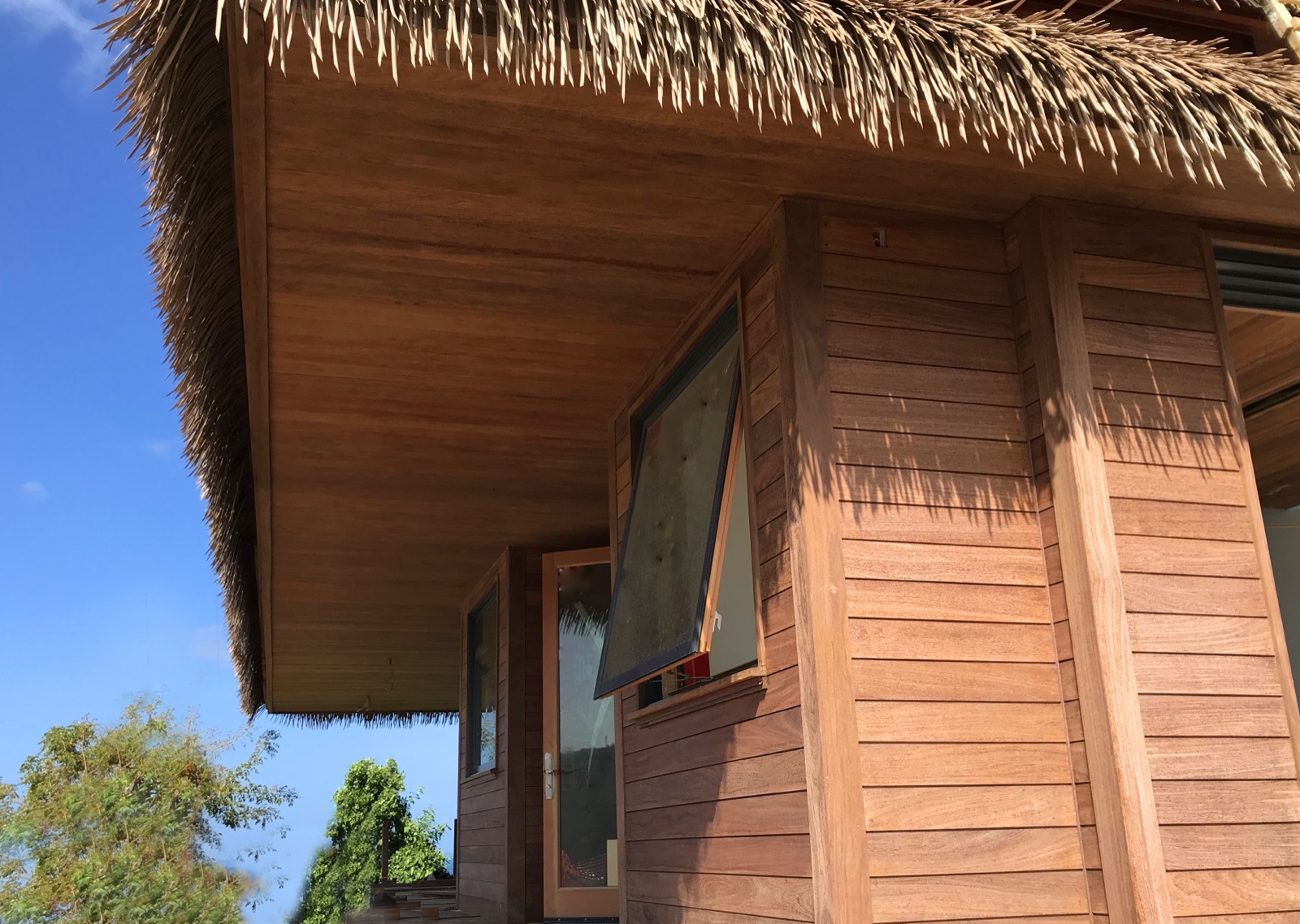 Hardwood cladding installed on a finished wall