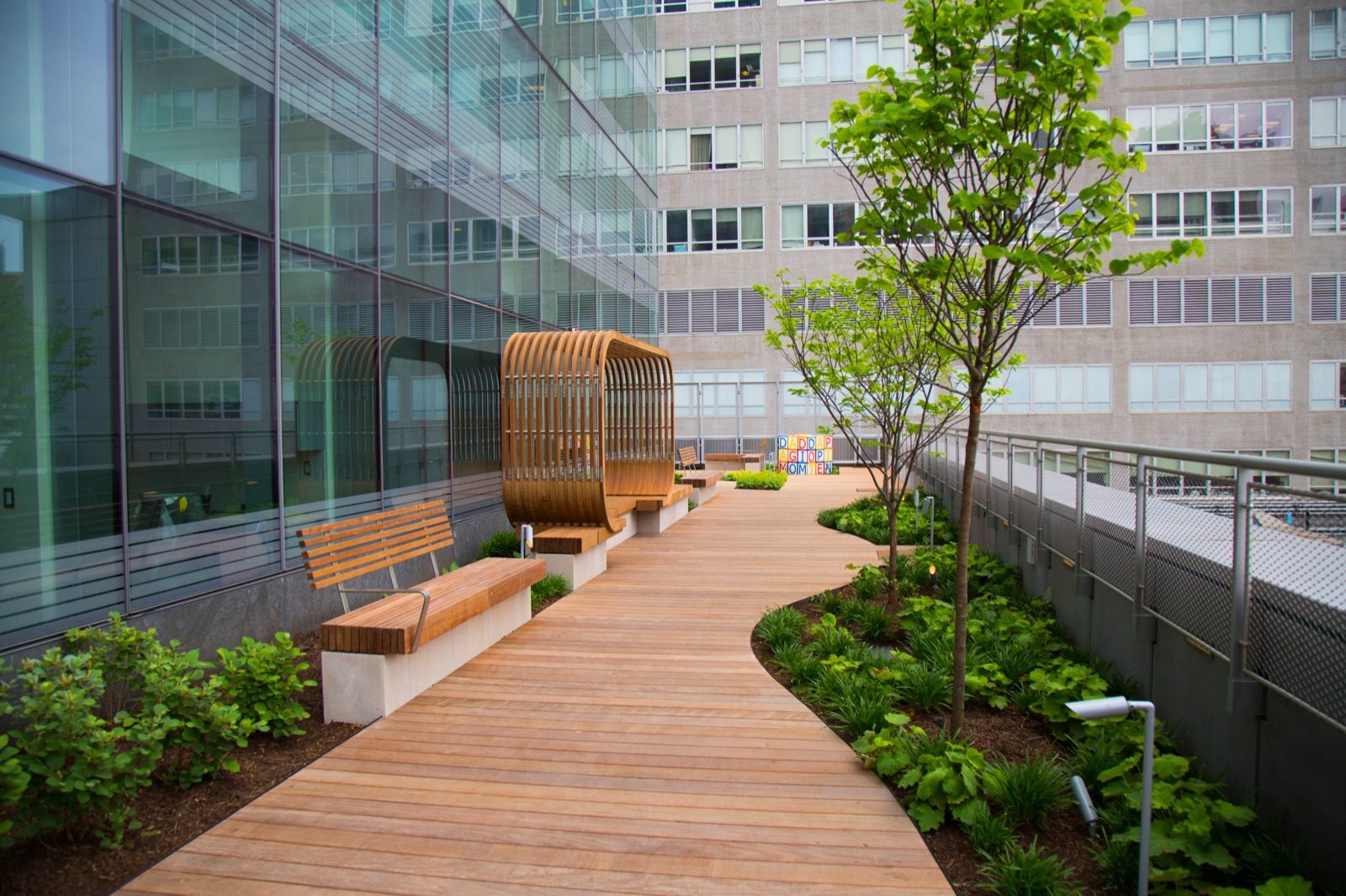 Rooftop hardwood terrace over an occupied building
