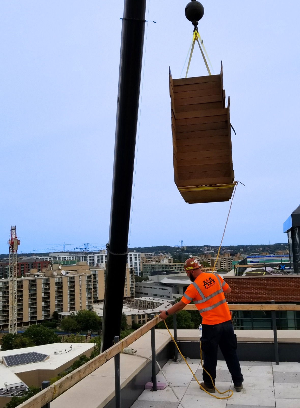 Rooftop Decking Weight, Board by Board: What a Crew Can Hoist, Stage and Install