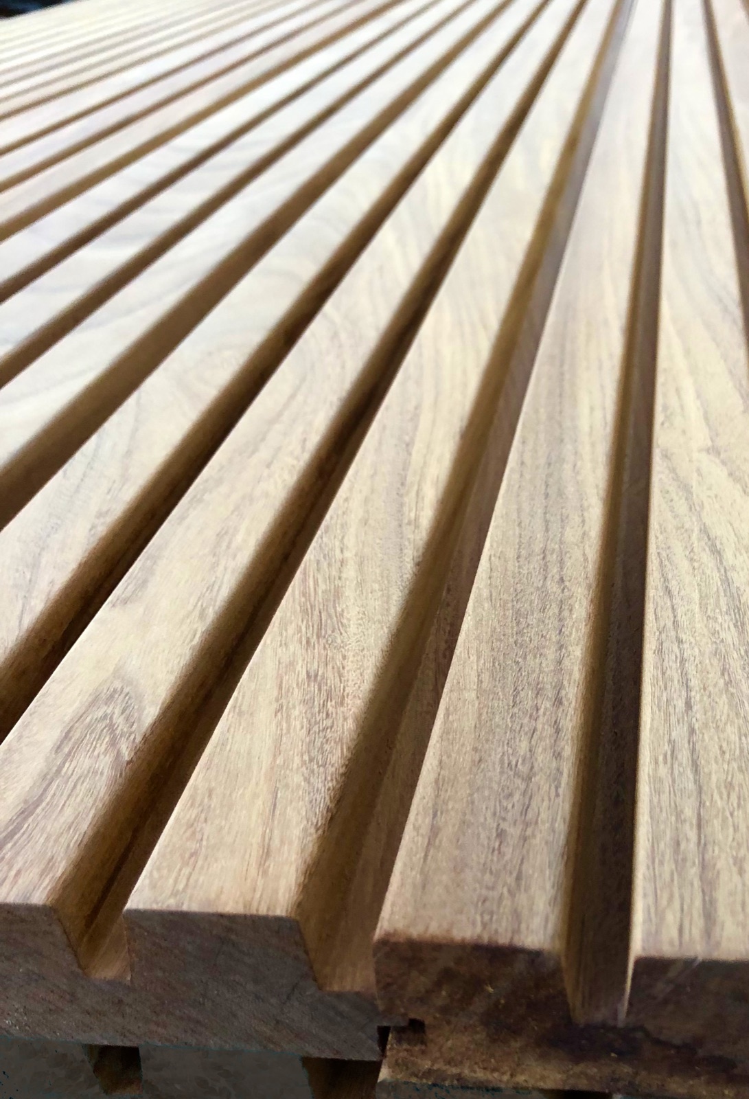 Fluted Teak panelling with the profile run through