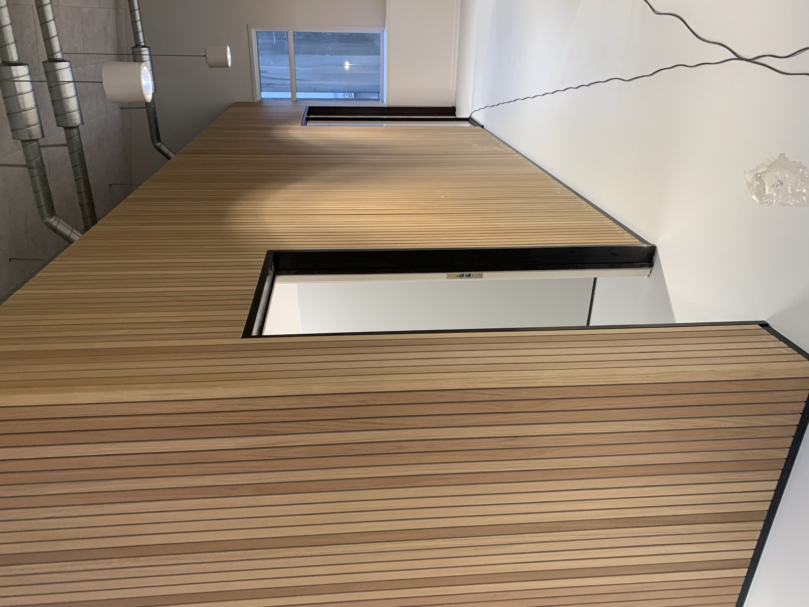 Thermally modified Iroko run as interior cladding